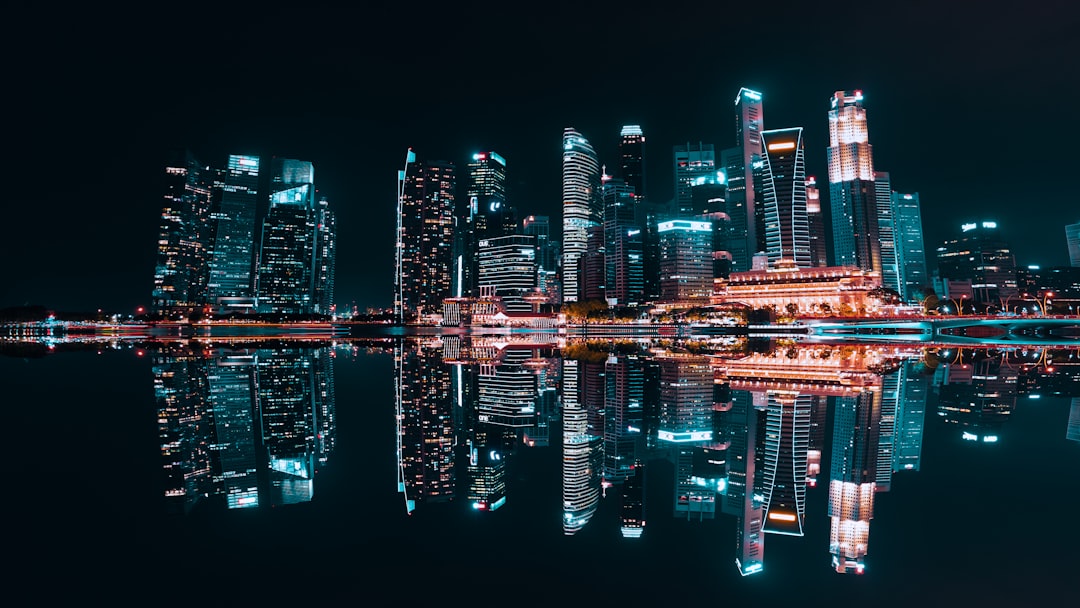 Singapore skyline at golden hour with alumni networking